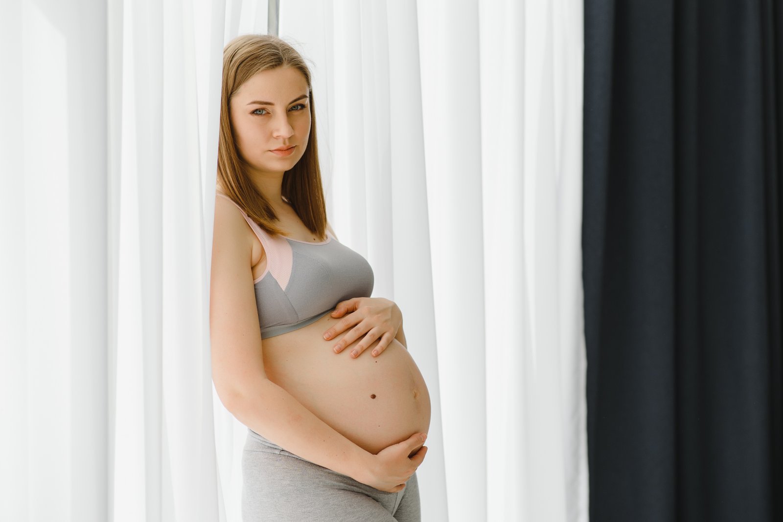 Pregnant woman at home